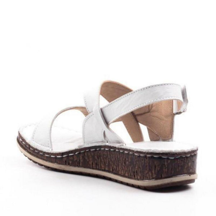 https://cdn.shopify.com/s/files/1/0620/0587/0655/files/elegant-womens-strappy-wedge-sandals-with-open-toes-slingback-straps-and-a-cork-look-base-perfect-fo-10.jpg?v=1755971407