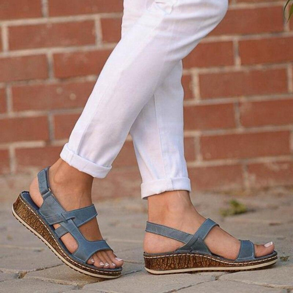 https://cdn.shopify.com/s/files/1/0620/0587/0655/files/elegant-womens-strappy-wedge-sandals-with-open-toes-slingback-straps-and-a-cork-look-base-perfect-fo-3.jpg?v=1755971394