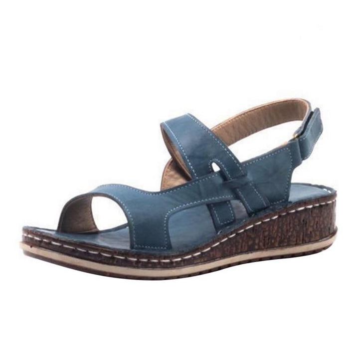 https://cdn.shopify.com/s/files/1/0620/0587/0655/files/elegant-womens-strappy-wedge-sandals-with-open-toes-slingback-straps-and-a-cork-look-base-perfect-fo-7.jpg?v=1755971402