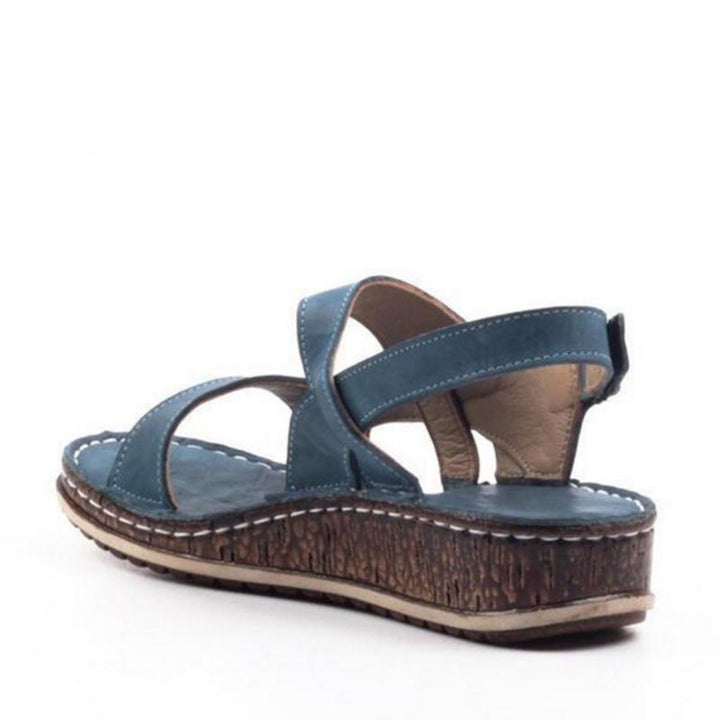 https://cdn.shopify.com/s/files/1/0620/0587/0655/files/elegant-womens-strappy-wedge-sandals-with-open-toes-slingback-straps-and-a-cork-look-base-perfect-fo-8.jpg?v=1755971404