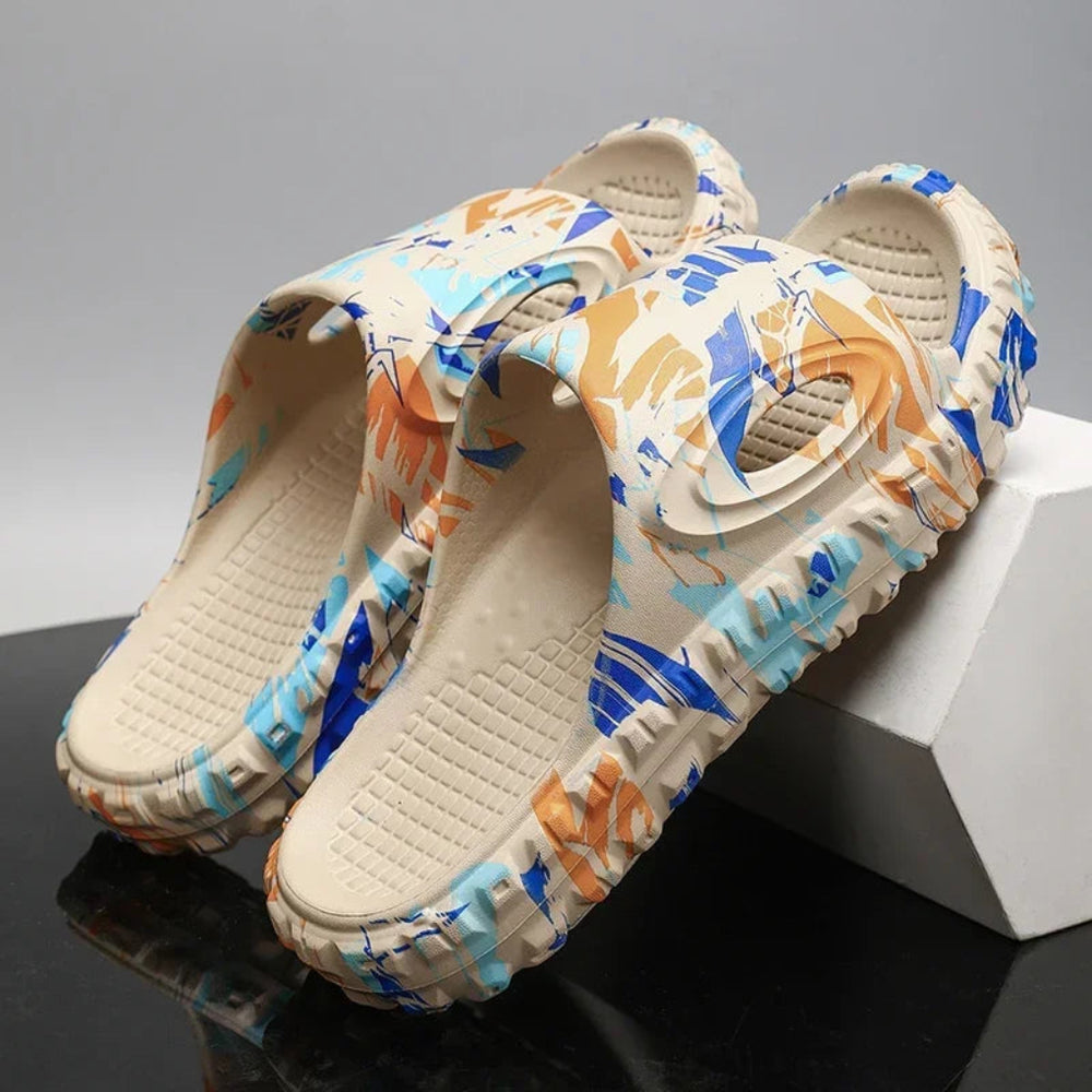 https://cdn.shopify.com/s/files/1/0620/0587/0655/files/unisex-black-cushioned-comfort-slide-sandals-for-c-1.webp?v=1770464062