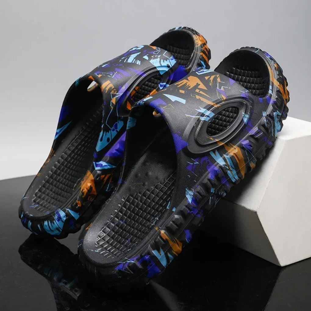 https://cdn.shopify.com/s/files/1/0620/0587/0655/files/unisex-black-cushioned-comfort-slide-sandals-for-c-2.webp?v=1770464067