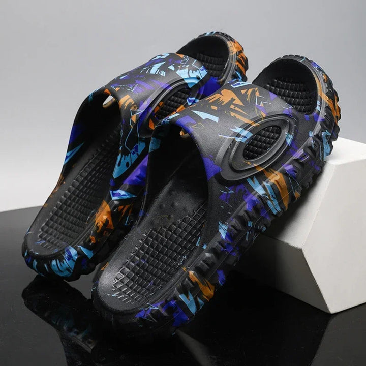 https://cdn.shopify.com/s/files/1/0620/0587/0655/files/unisex-black-cushioned-comfort-slide-sandals-for-c-2.webp?v=1770464067