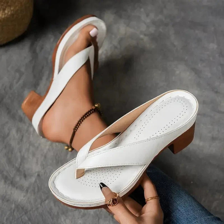 https://cdn.shopify.com/s/files/1/0620/0587/0655/files/womens-orthopedic-heel-sandals-black-4091588.webp?v=1755114089