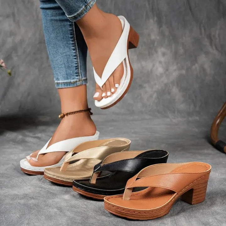 https://cdn.shopify.com/s/files/1/0620/0587/0655/files/womens-orthopedic-heel-sandals-black-4137483.webp?v=1755114088