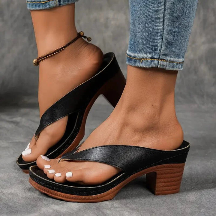 https://cdn.shopify.com/s/files/1/0620/0587/0655/files/womens-orthopedic-heel-sandals-black-6529390.webp?v=1755114088